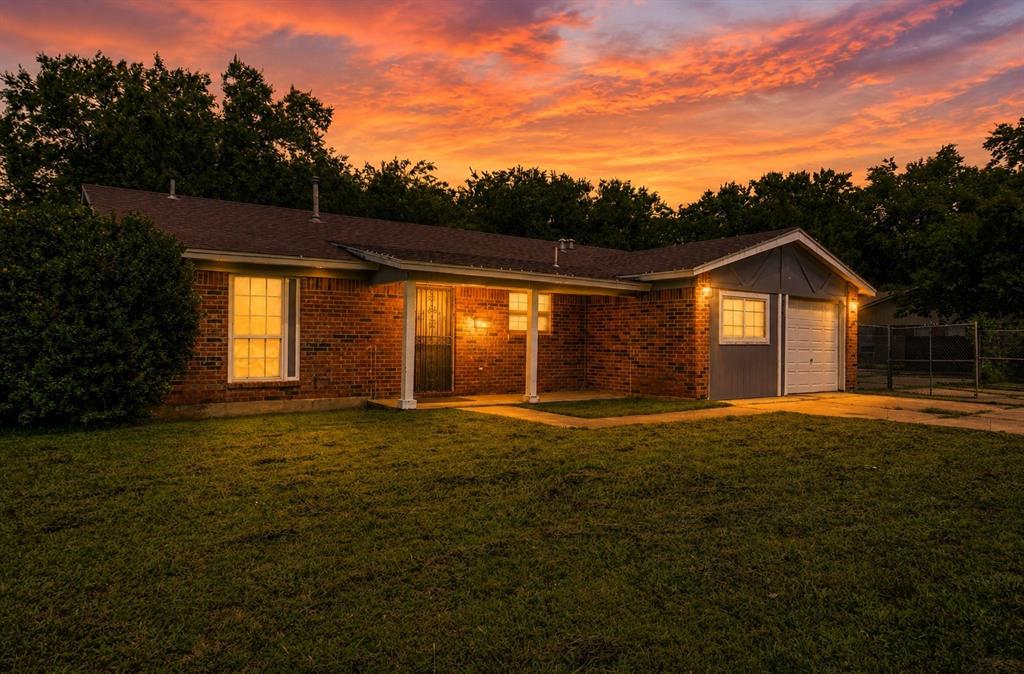 300 Coury Road Everman, TX 76140 - Photo 3 of 29 a view of an house with backyard and garden