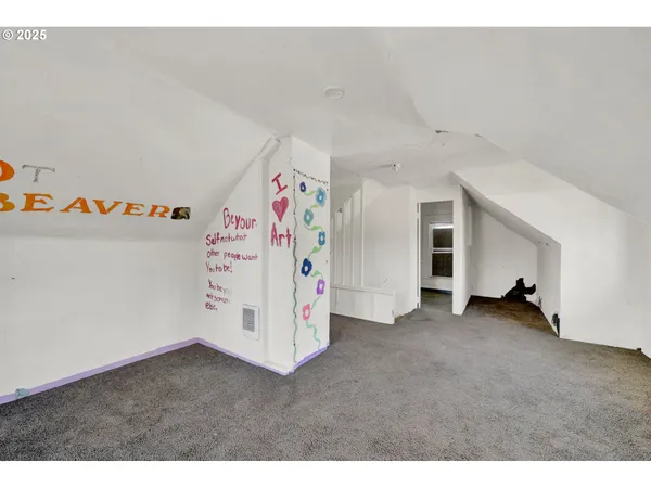 a bathroom with a bathtub and a toilet