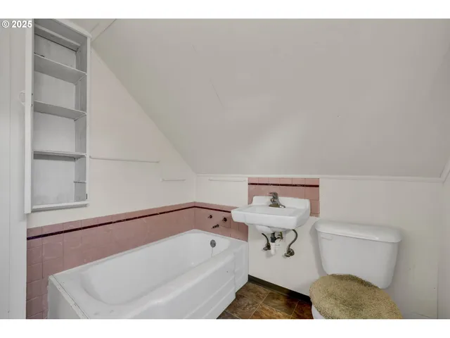 a view of yard with large trees