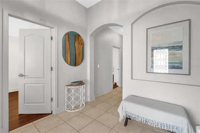 a bathroom with a toilet and a tub