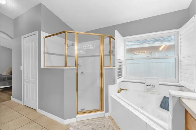 a bathroom with a bathtub and a sink