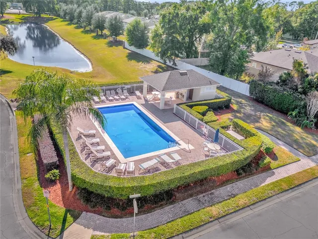 swimming pool with chairs
