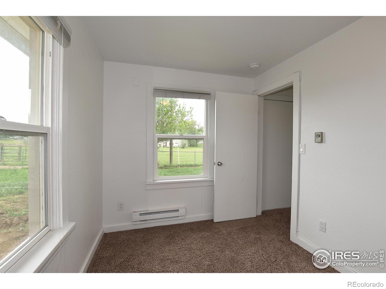 1340 North Taft Hill Road Fort Collins, CO 80521 - Photo 29 of 40 an empty room with windows