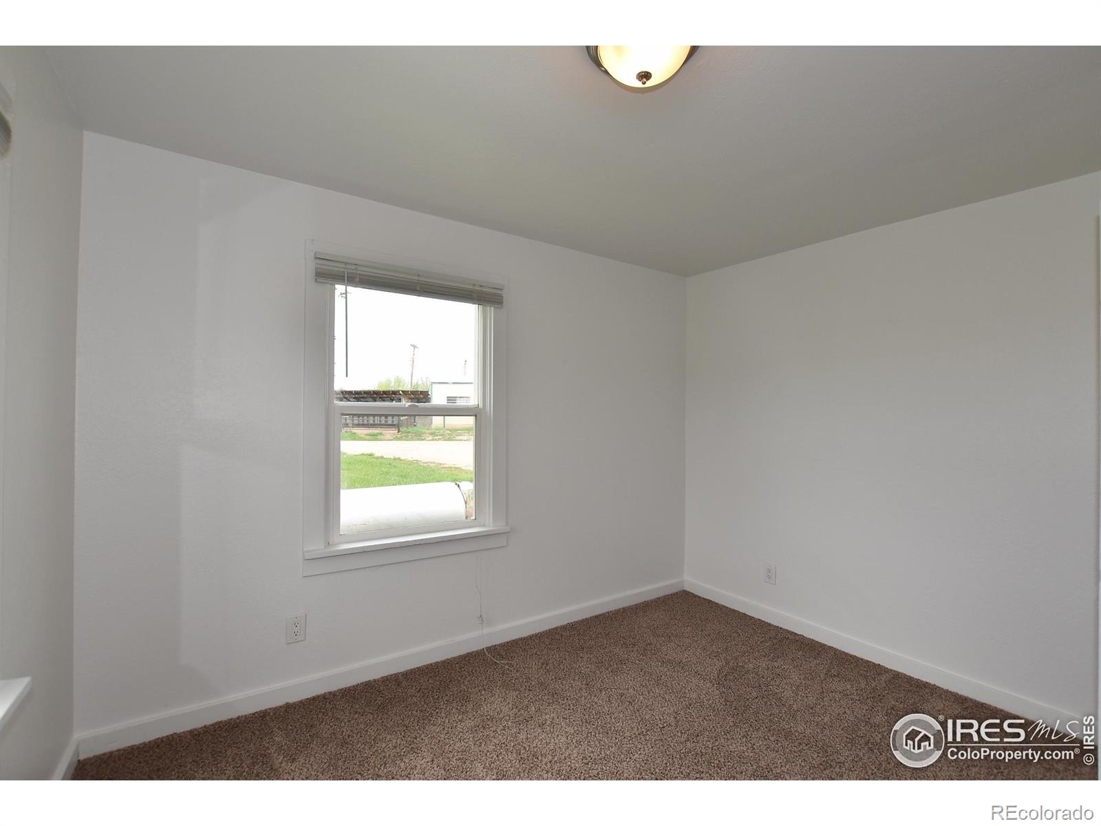 1340 North Taft Hill Road Fort Collins, CO 80521 - Photo 31 of 40 a view of an empty room and window