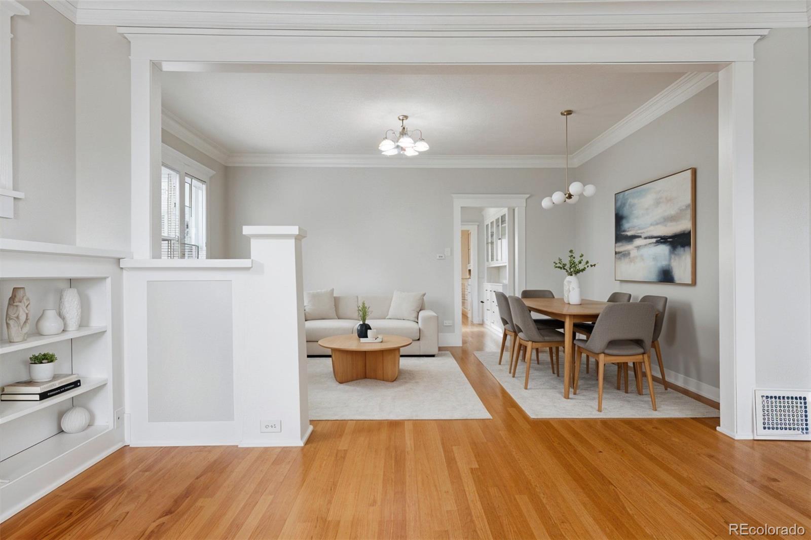 1411-1419 Meade Street Denver, CO 80204 - Photo 3 of 20 a living room with furniture and a wooden floor
