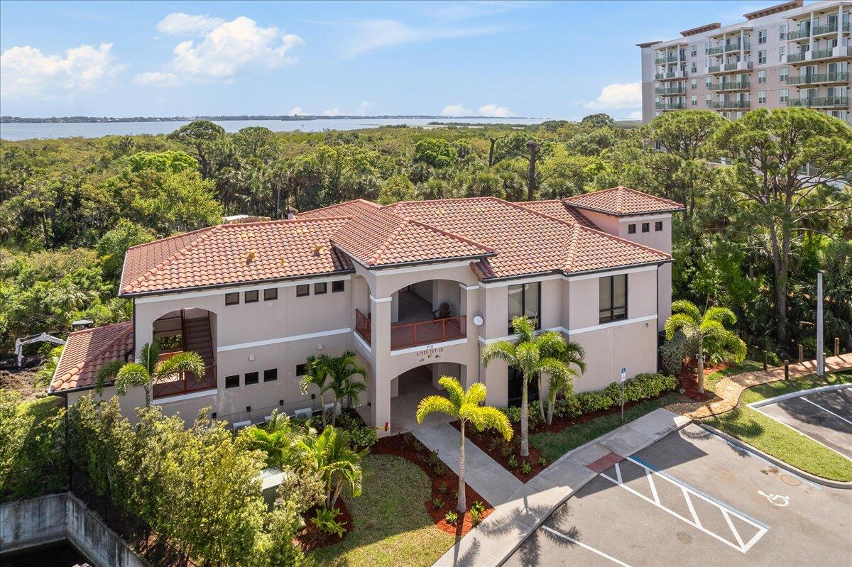 735 Pilot Lane, Unit 314 Merritt Island, FL 32952 - Photo 16 of 41 an aerial view of a house with yard and outdoor seating