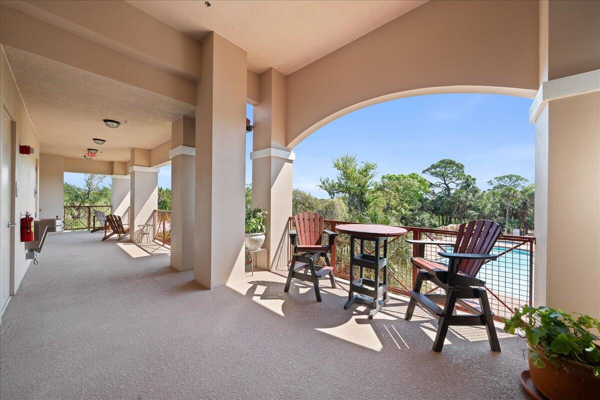735 Pilot Lane, Unit 314 Merritt Island, FL 32952 - Photo 19 of 41 a view of an chairs and table in the room