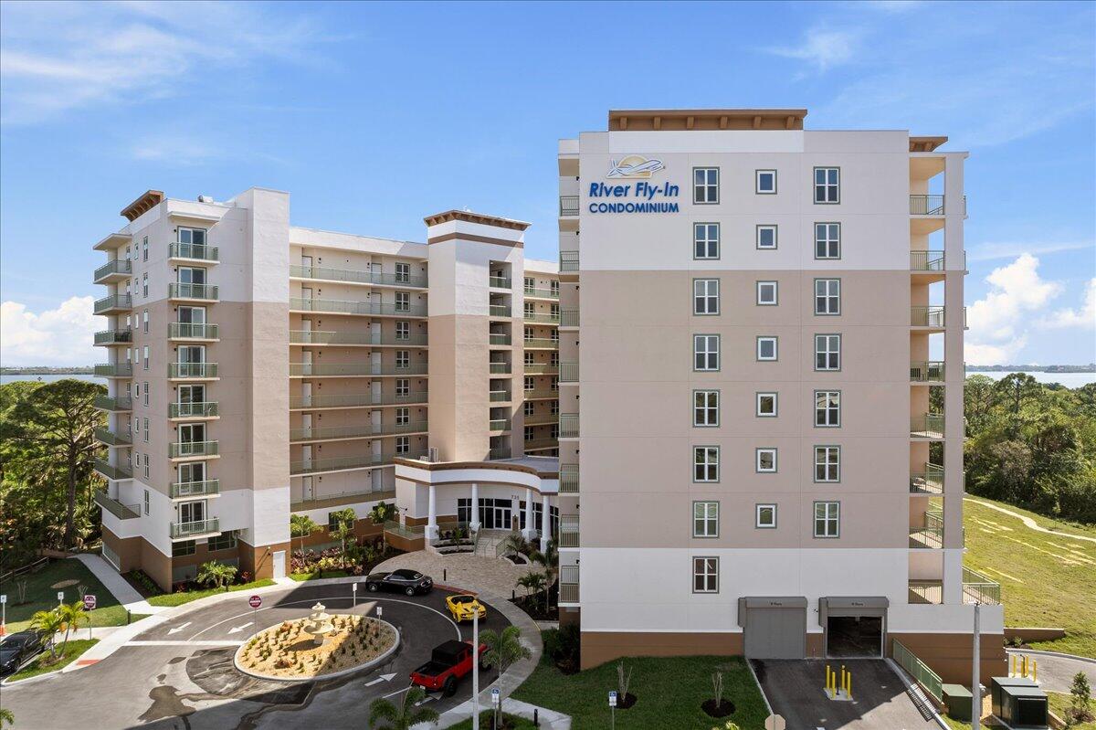 735 Pilot Lane, Unit 314 Merritt Island, FL 32952 - Photo 31 of 41 a city street filled with lots of tall buildings