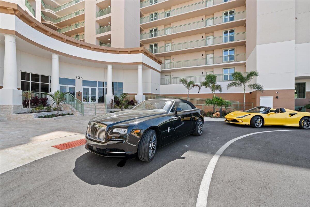 735 Pilot Lane, Unit 314 Merritt Island, FL 32952 - Photo 34 of 41 a car parked in front of a building