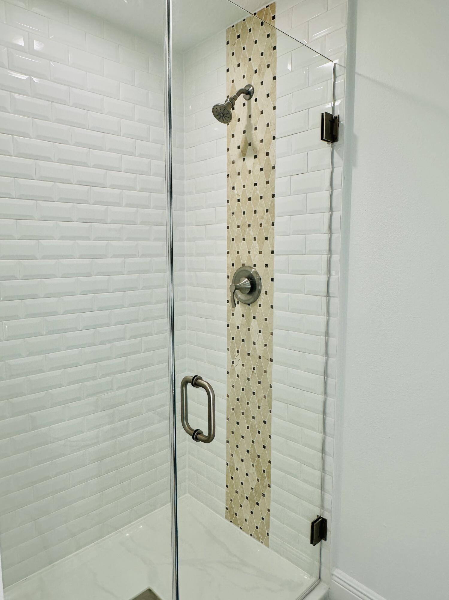 735 Pilot Lane, Unit 314 Merritt Island, FL 32952 - Photo 4 of 41 a bathroom with a shower