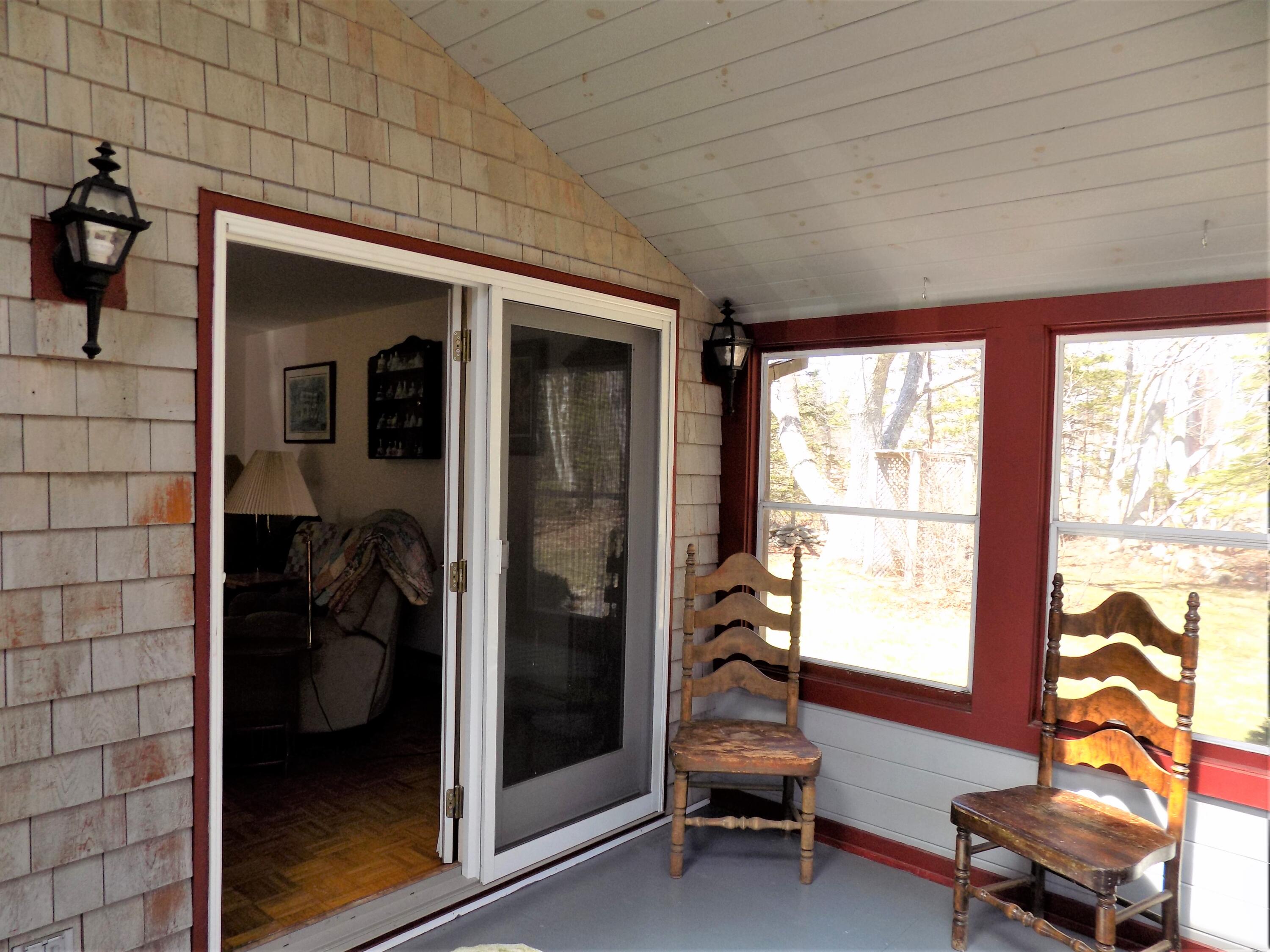 731 North Deer Isle Road Deer Isle, ME 04627 - Photo 13 of 44 sunroom house entry