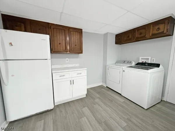 a utility room with washer and dryer