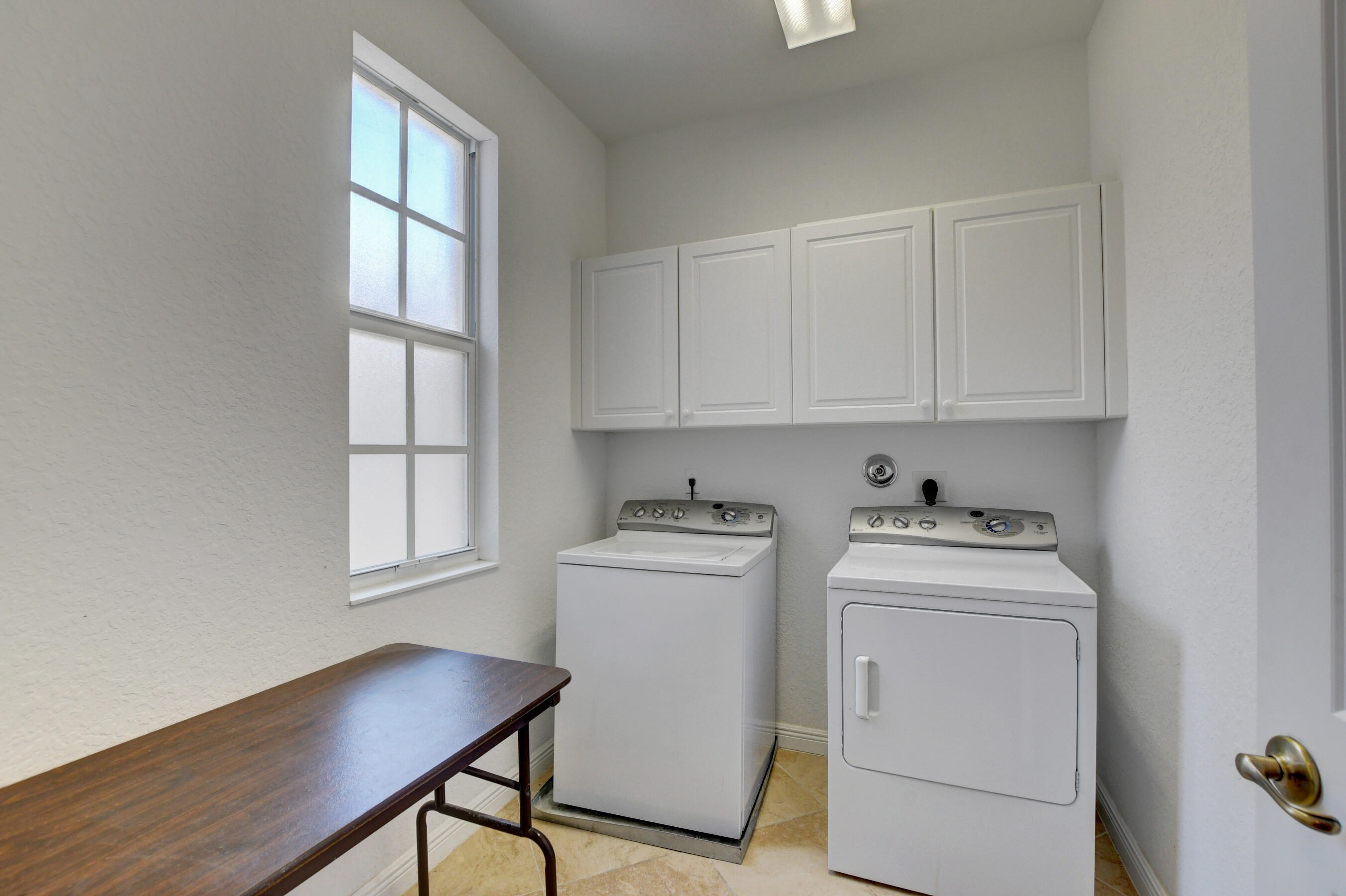 8308 Northwest 8th Way Boca Raton, FL 33487 - Photo 32 of 52 Upstairs laundry room