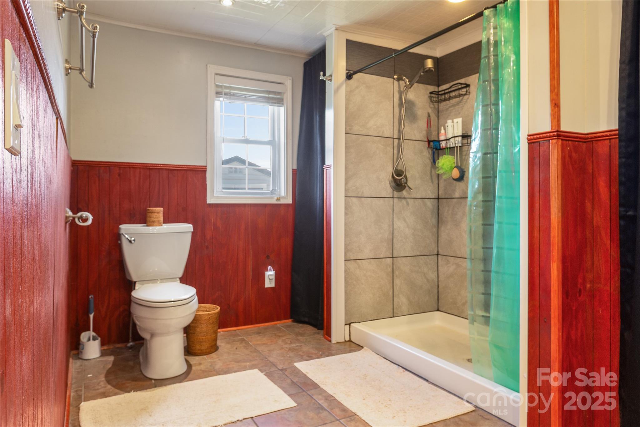 333 Oakview Park Road Asheville, NC 28803 - Photo 12 of 31 a bathroom with a toilet and a shower