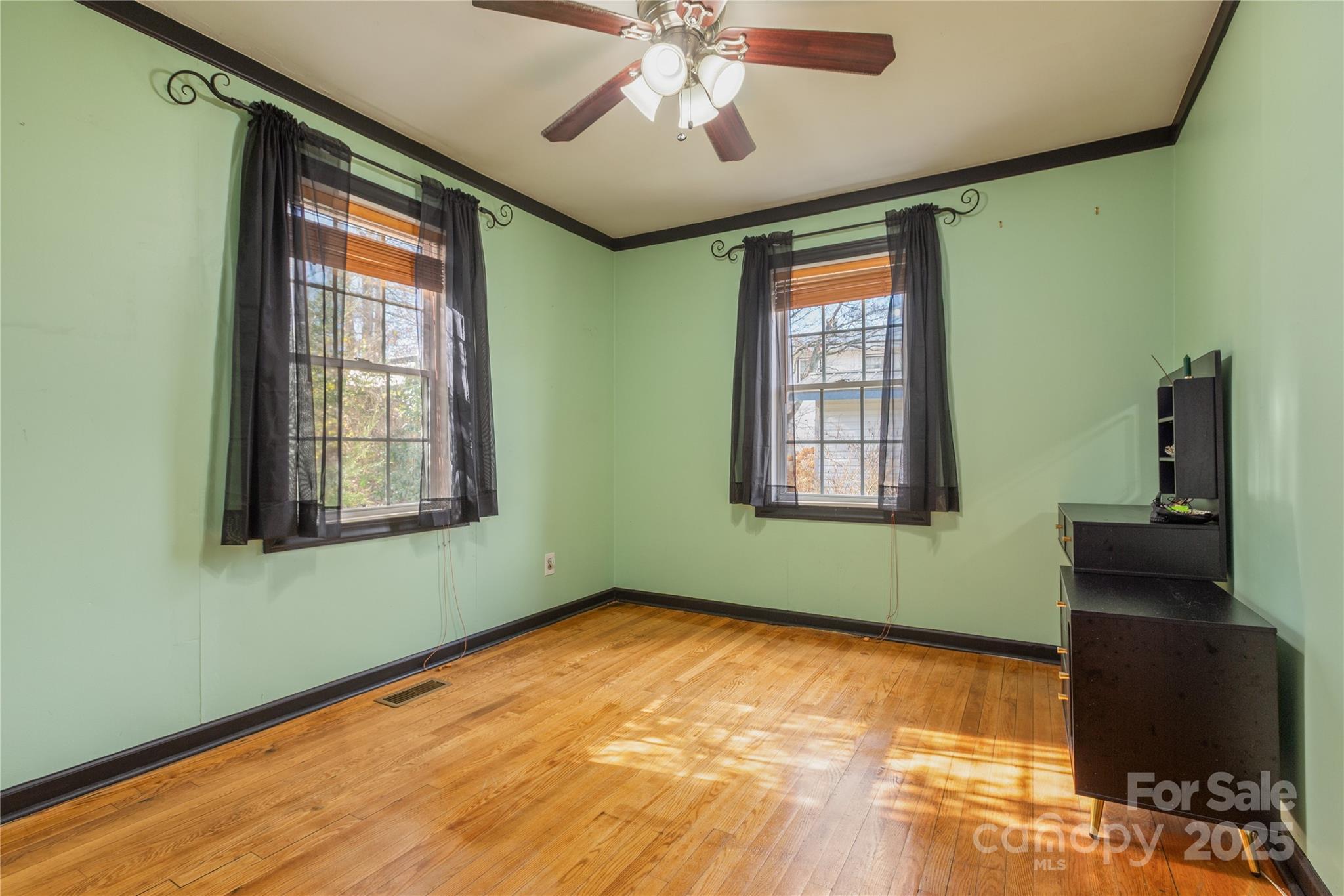 333 Oakview Park Road Asheville, NC 28803 - Photo 15 of 31 a view of empty room with window and ceiling fan