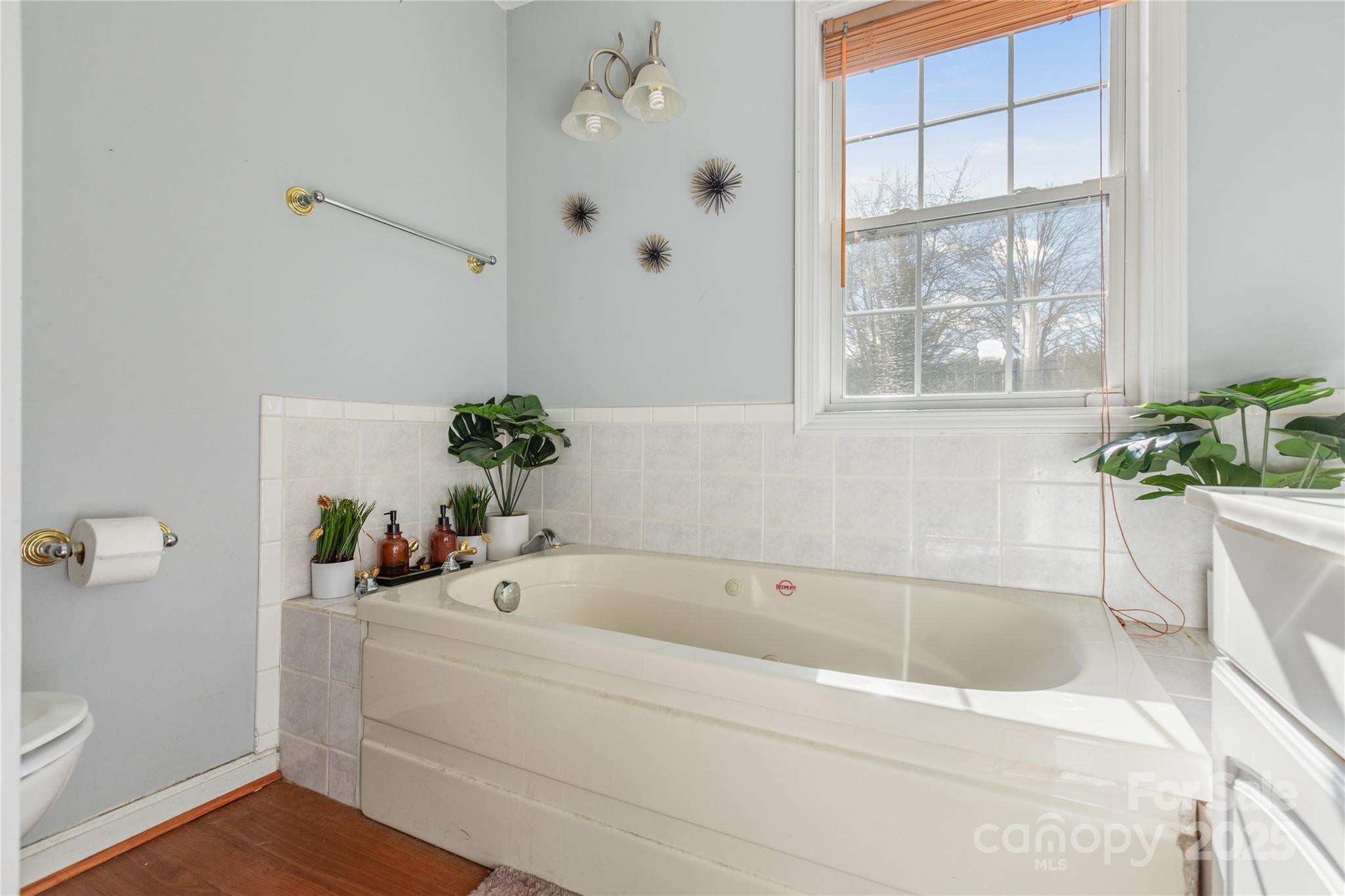 333 Oakview Park Road Asheville, NC 28803 - Photo 17 of 31 a white bath tub sitting next to a white sink