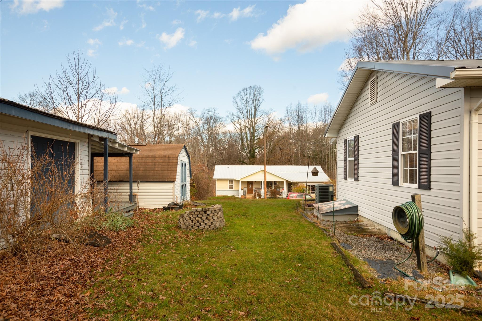 333 Oakview Park Road Asheville, NC 28803 - Photo 23 of 31 a front view of a house with garden