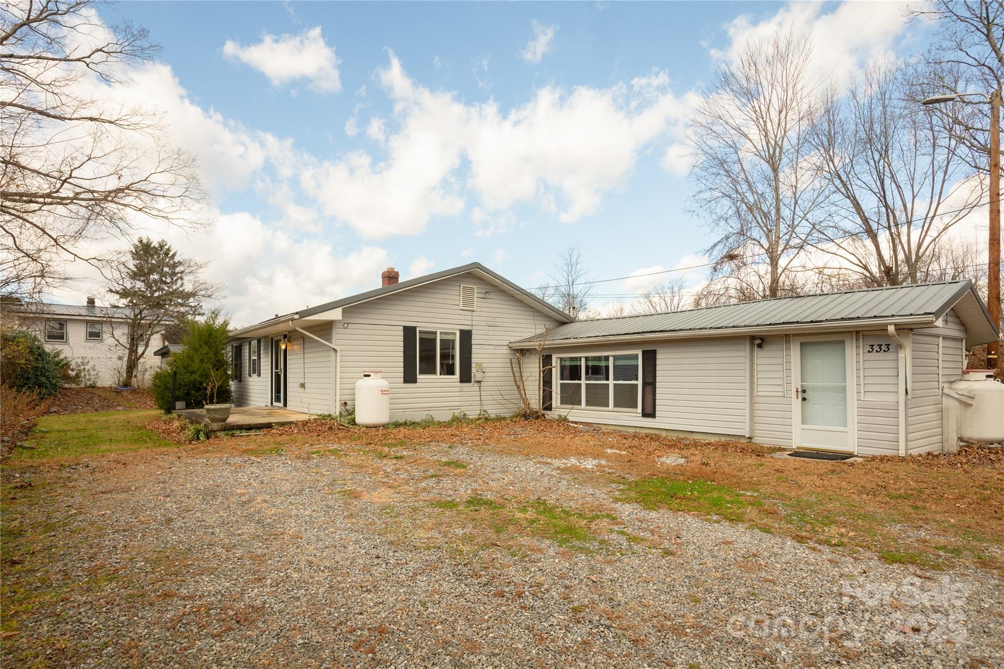 333 Oakview Park Road Asheville, NC 28803 - Photo 29 of 31 a view of a house with a yard