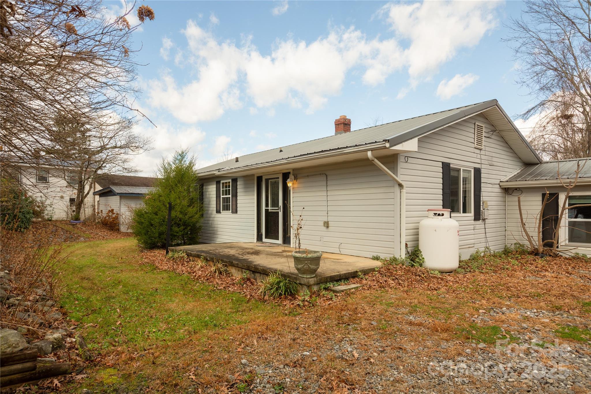 333 Oakview Park Road Asheville, NC 28803 - Photo 30 of 31 a view of a house with backyard and garden