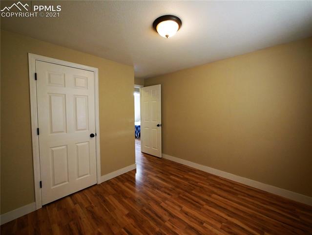 402 Yellowstone Road Colorado Springs, CO 80910 - Photo 11 of 28 Upper Bedroom 1