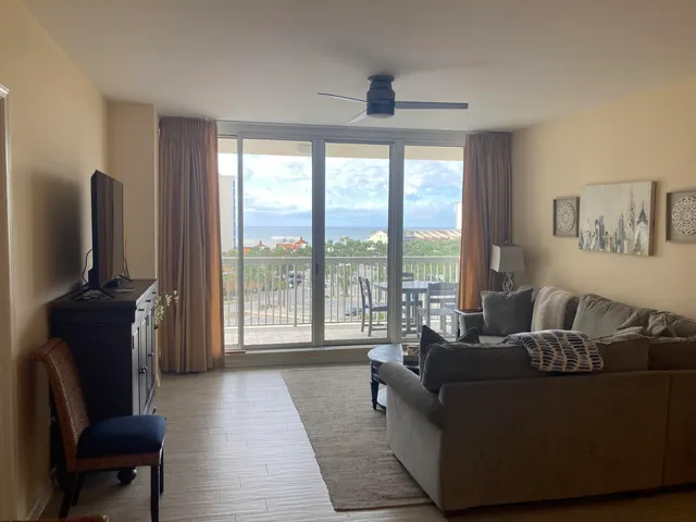 a living room with furniture and a couch
