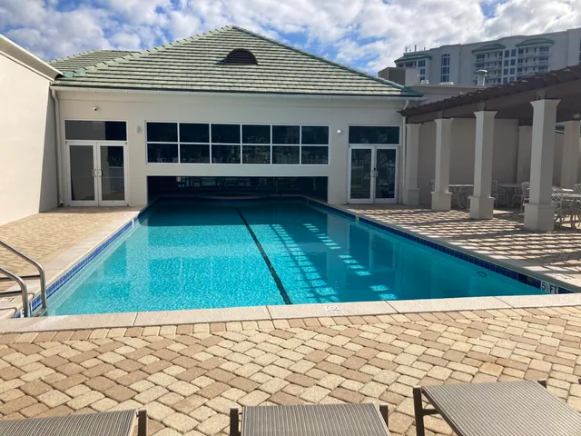 a view of a chairs and tables in patio