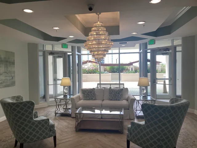 a view of a building with a yard