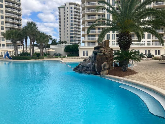 a view of a balcony with chairs
