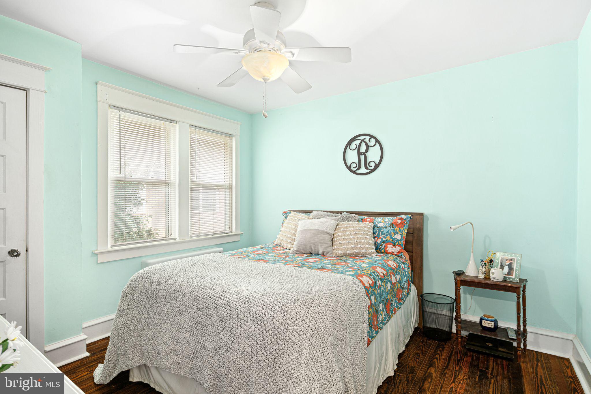 23 Ormond Avenue Haddon Township, NJ 08107 - Photo 13 of 34 a bedroom with a bed and a table