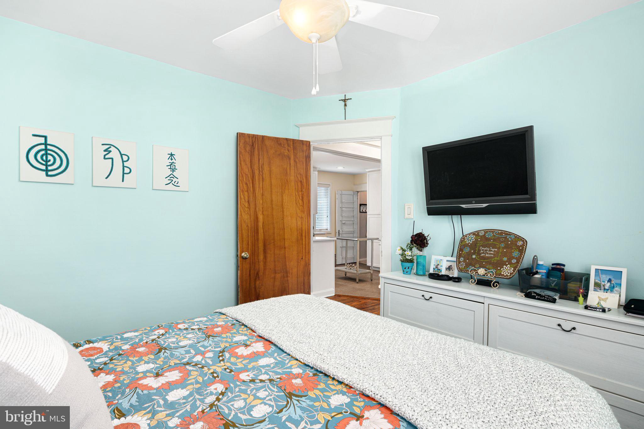 23 Ormond Avenue Haddon Township, NJ 08107 - Photo 15 of 34 a bedroom with a bed and a flat screen tv