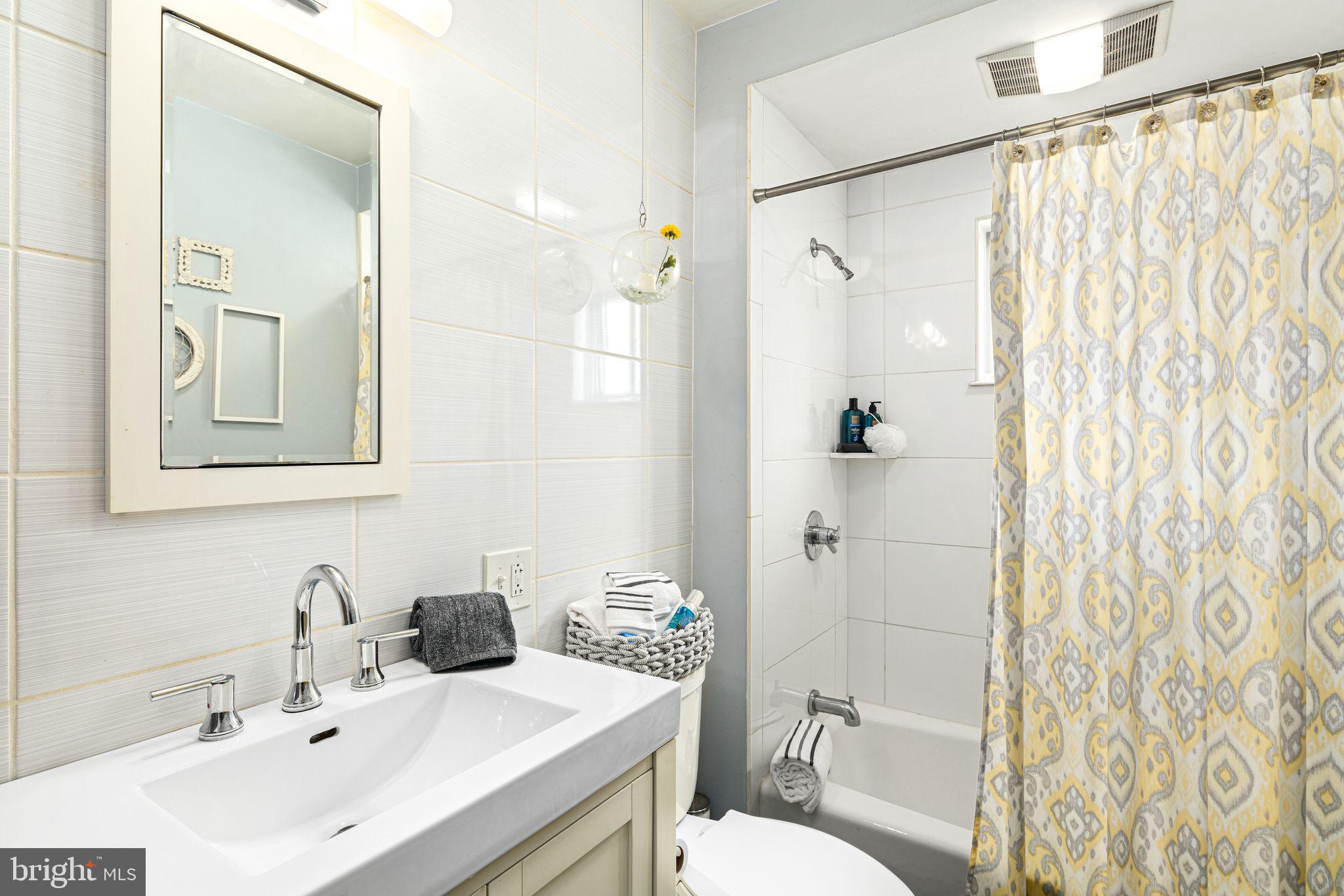 23 Ormond Avenue Haddon Township, NJ 08107 - Photo 16 of 34 a bathroom with a sink mirror toilet and shower