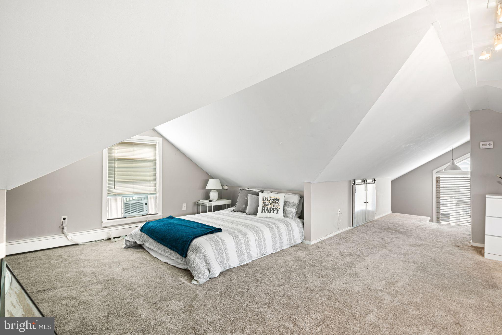23 Ormond Avenue Haddon Township, NJ 08107 - Photo 21 of 34 a spacious bedroom with a bed and window