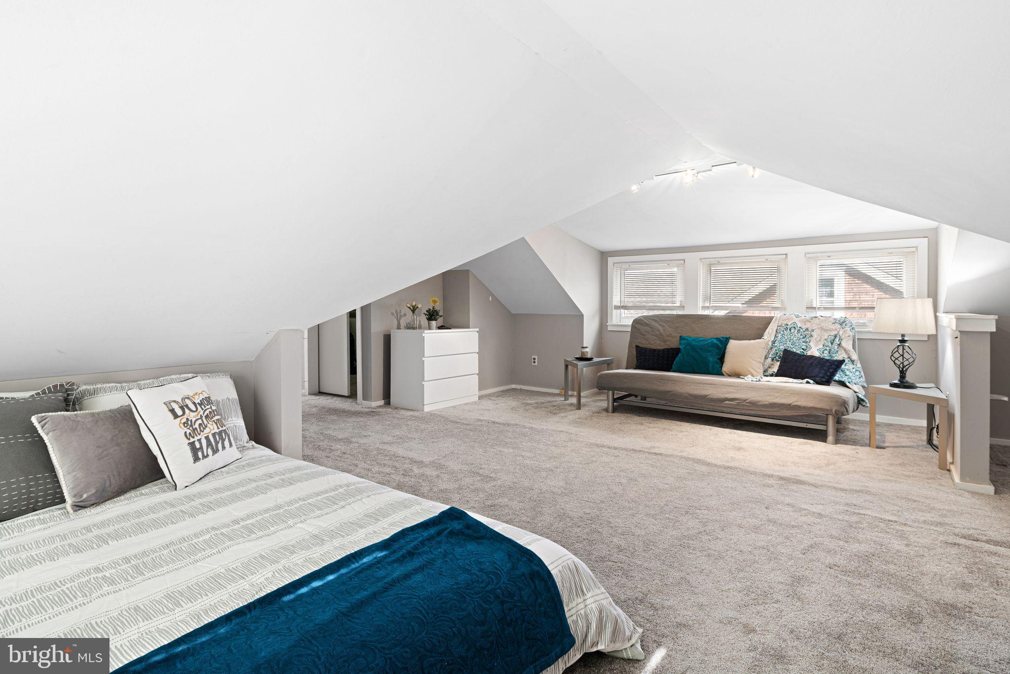 23 Ormond Avenue Haddon Township, NJ 08107 - Photo 22 of 34 a spacious bedroom with a bed and window