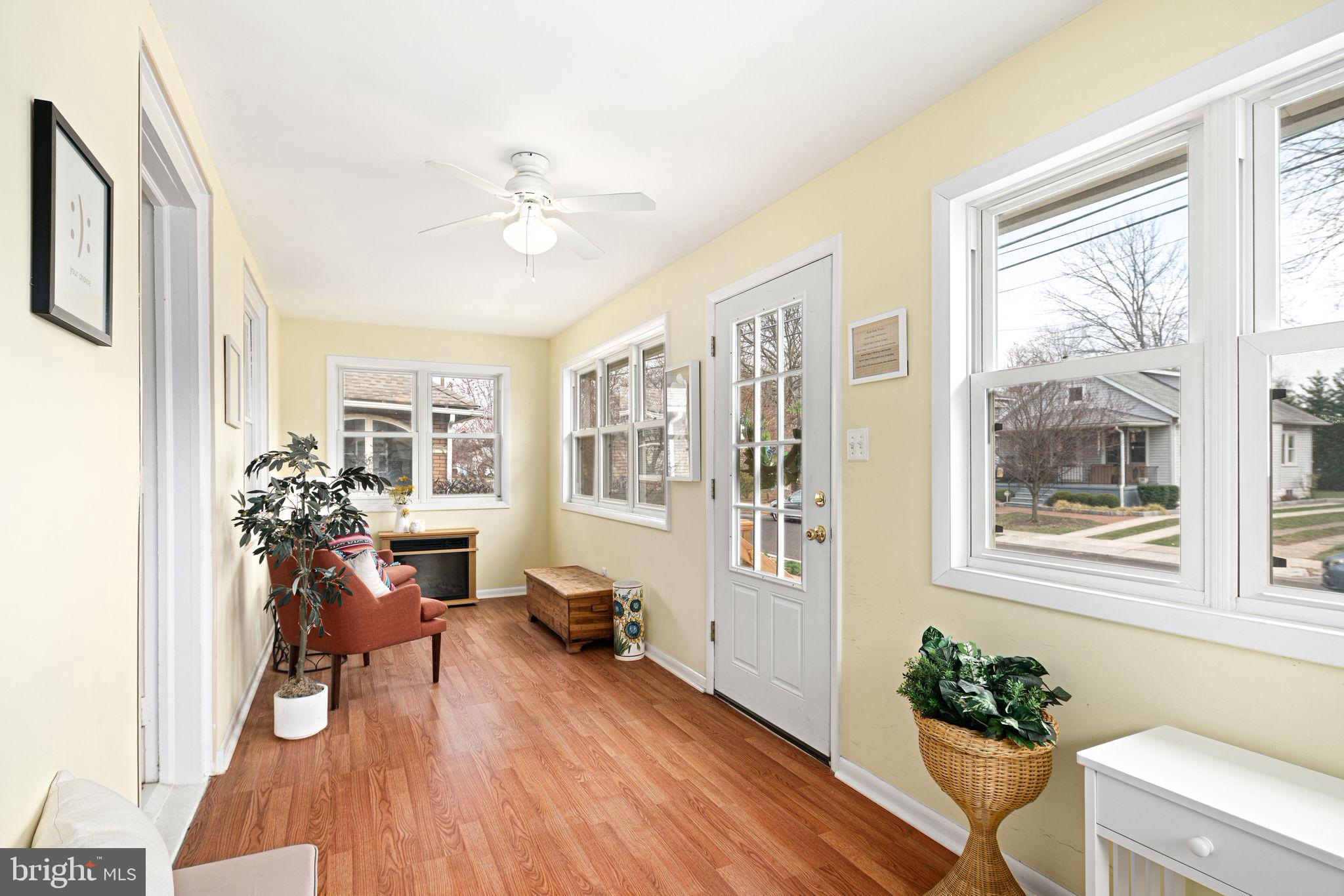 23 Ormond Avenue Haddon Township, NJ 08107 - Photo 3 of 34 a living room with furniture and a chandelier