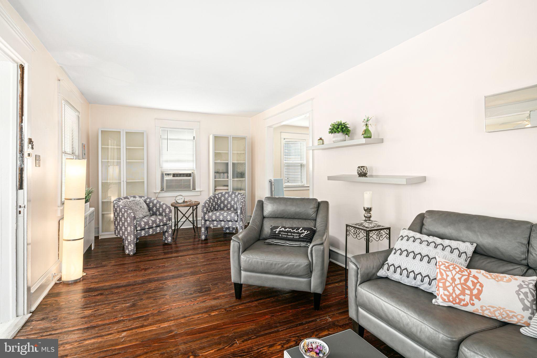 23 Ormond Avenue Haddon Township, NJ 08107 - Photo 4 of 34 a living room with furniture and a wooden floor