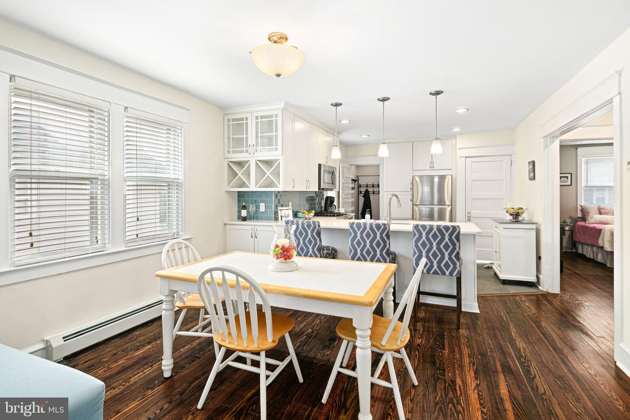 23 Ormond Avenue Haddon Township, NJ 08107 - Photo 7 of 34 a view of a dining room with furniture and wooden floor