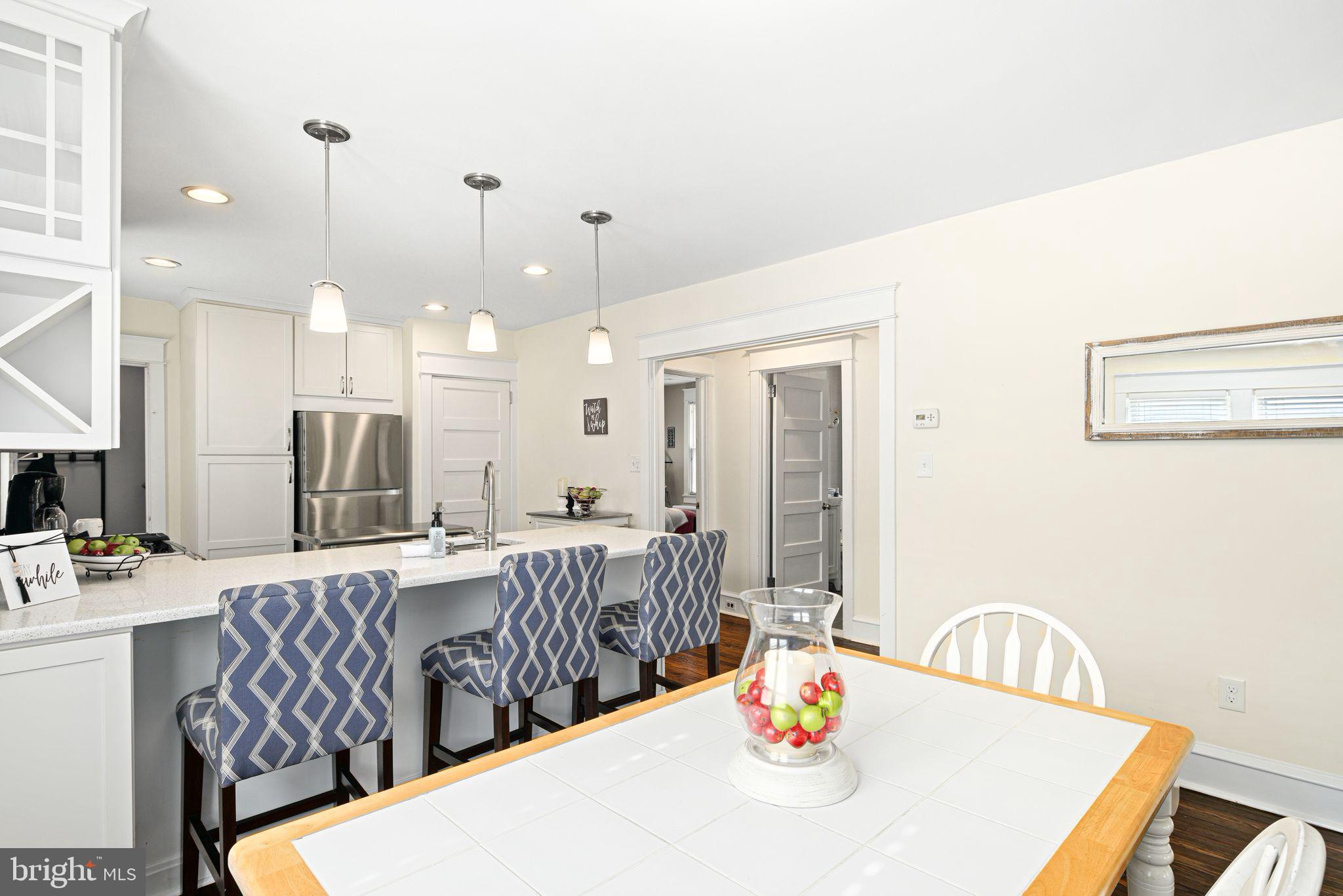 23 Ormond Avenue Haddon Township, NJ 08107 - Photo 10 of 34 a dining room with furniture and wooden floor
