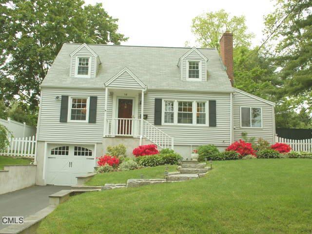 a front view of house with yard