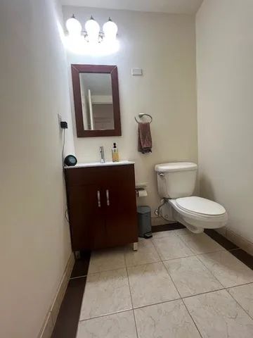 a view of a city with tall buildings in the background