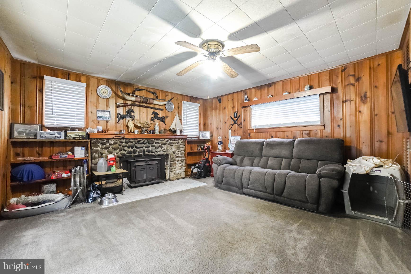 20542 Poplar Ridge Road Lexington Park, MD 20653 - Photo 15 of 46 Wood Burning Fireplace (FP #2)Room leads to Patio