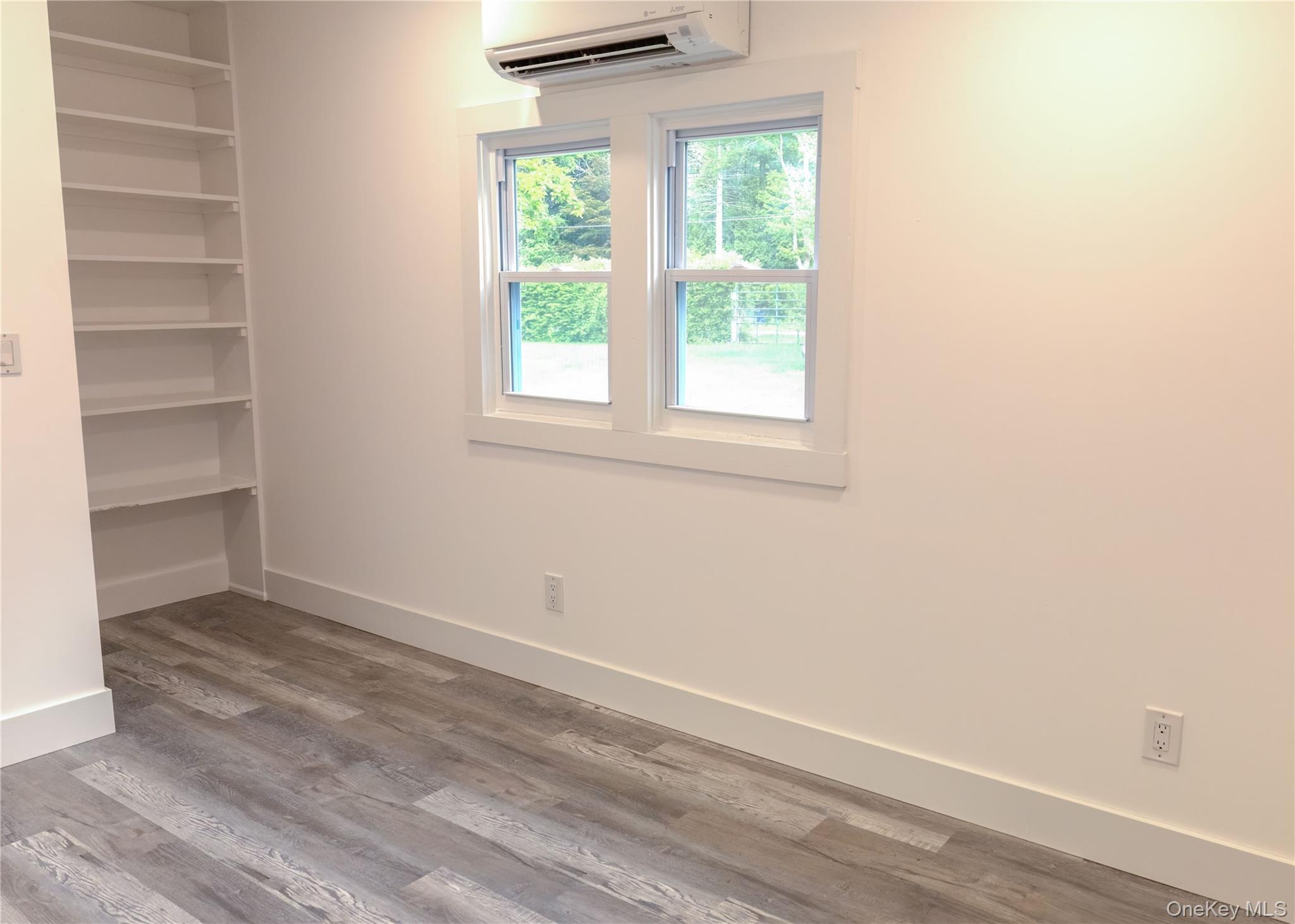 23 Lucille Road Carmel, NY 10512 - Photo 10 of 44 an empty room with a window