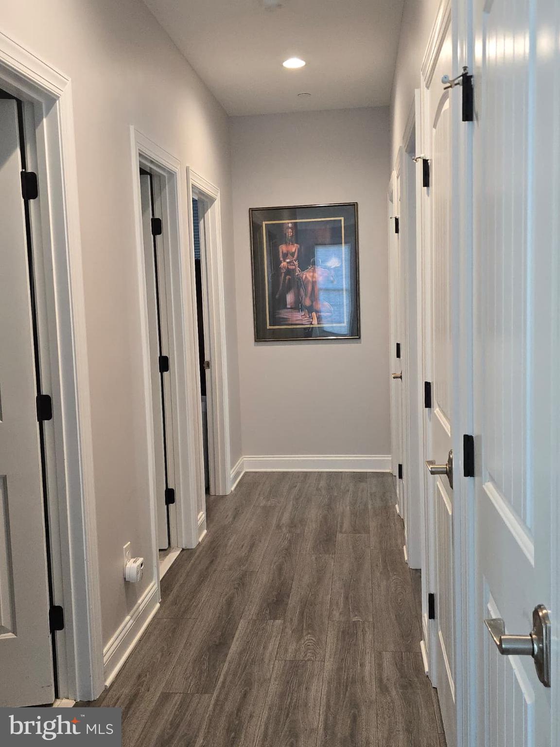 209 3rd Street Crumpton, MD 21628 - Photo 24 of 53 a view of a hallway with wooden floor and staircase