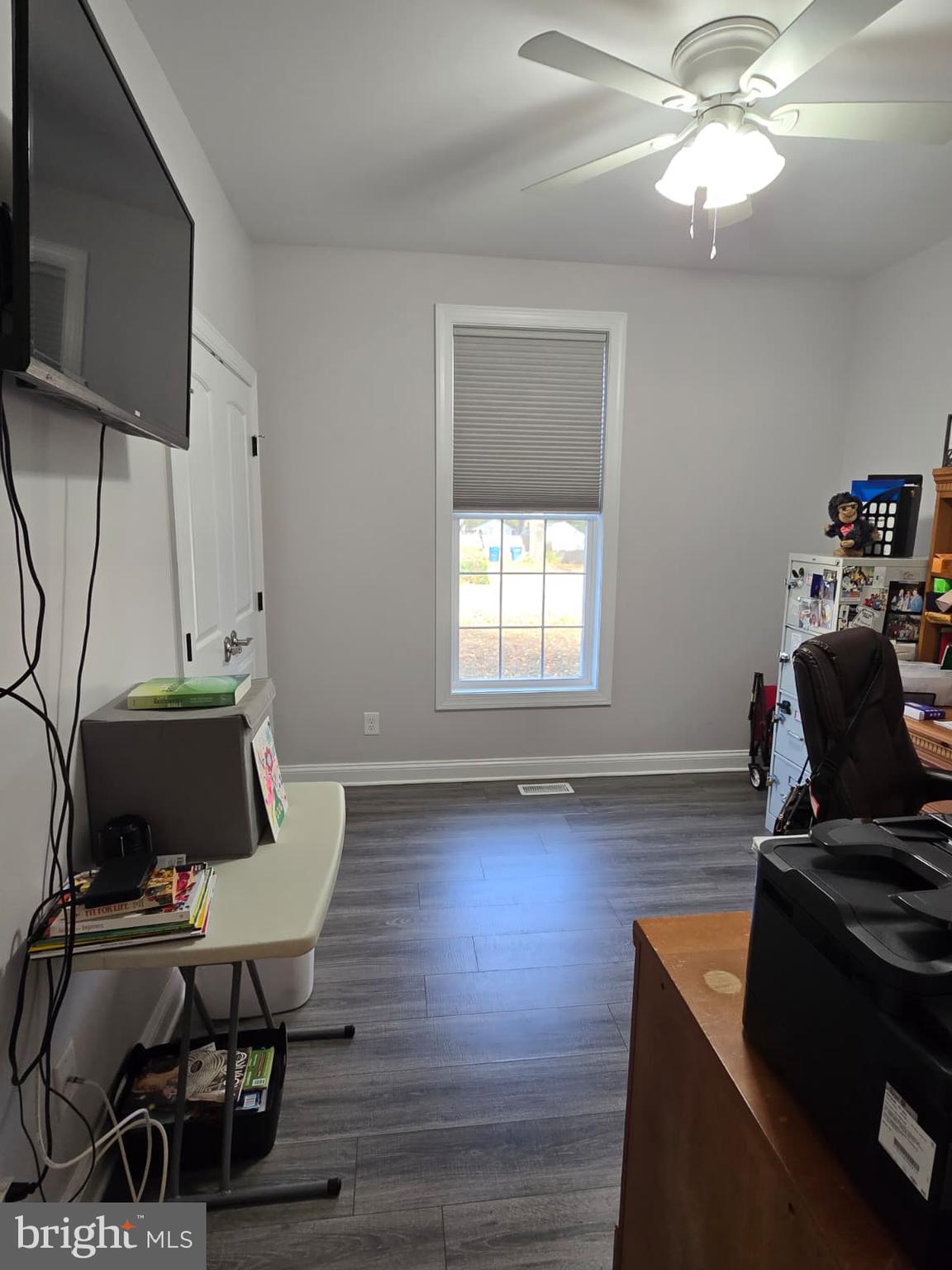 209 3rd Street Crumpton, MD 21628 - Photo 28 of 53 a living room with furniture and a window