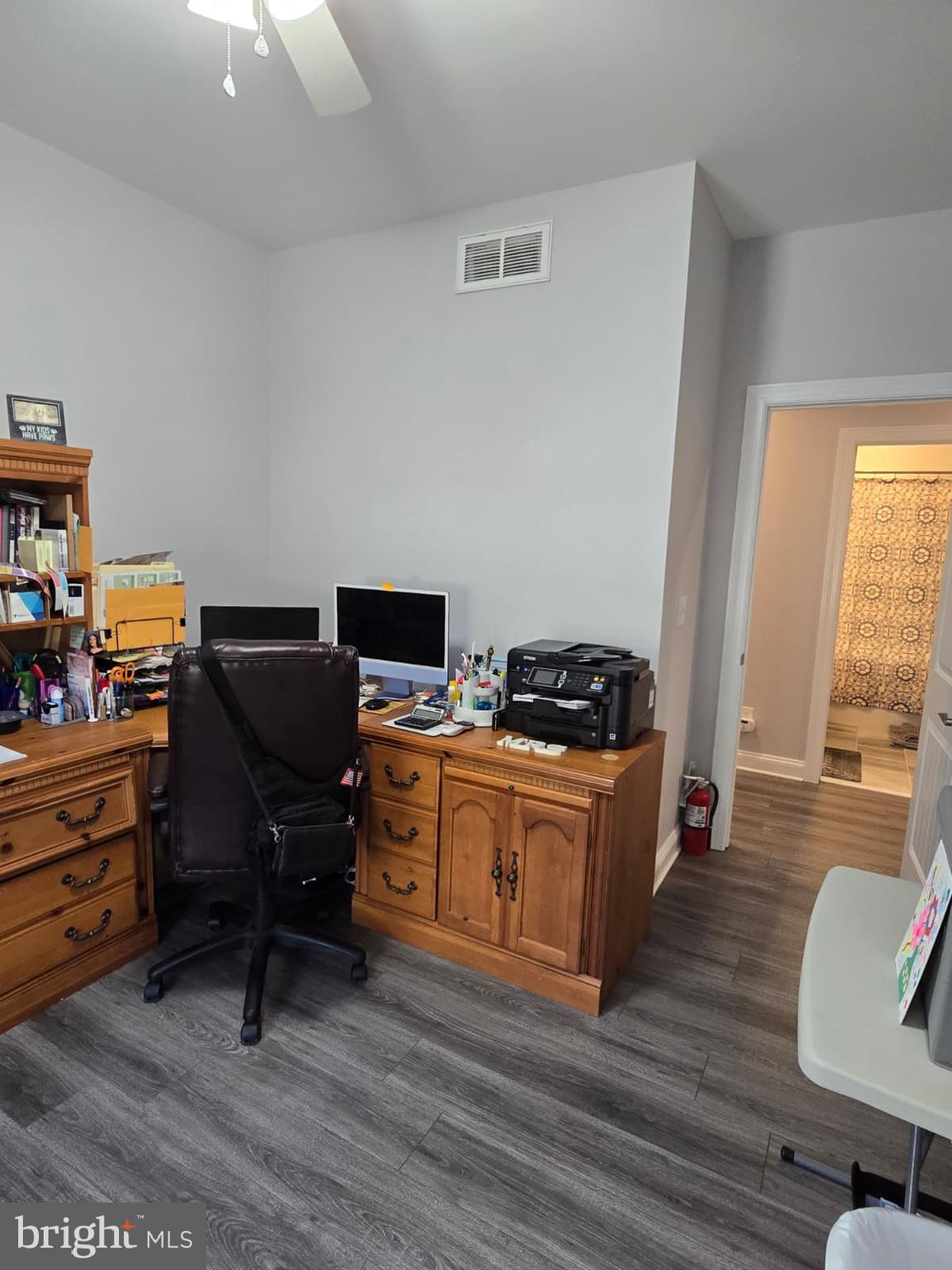 209 3rd Street Crumpton, MD 21628 - Photo 29 of 53 a living room with furniture and a piano