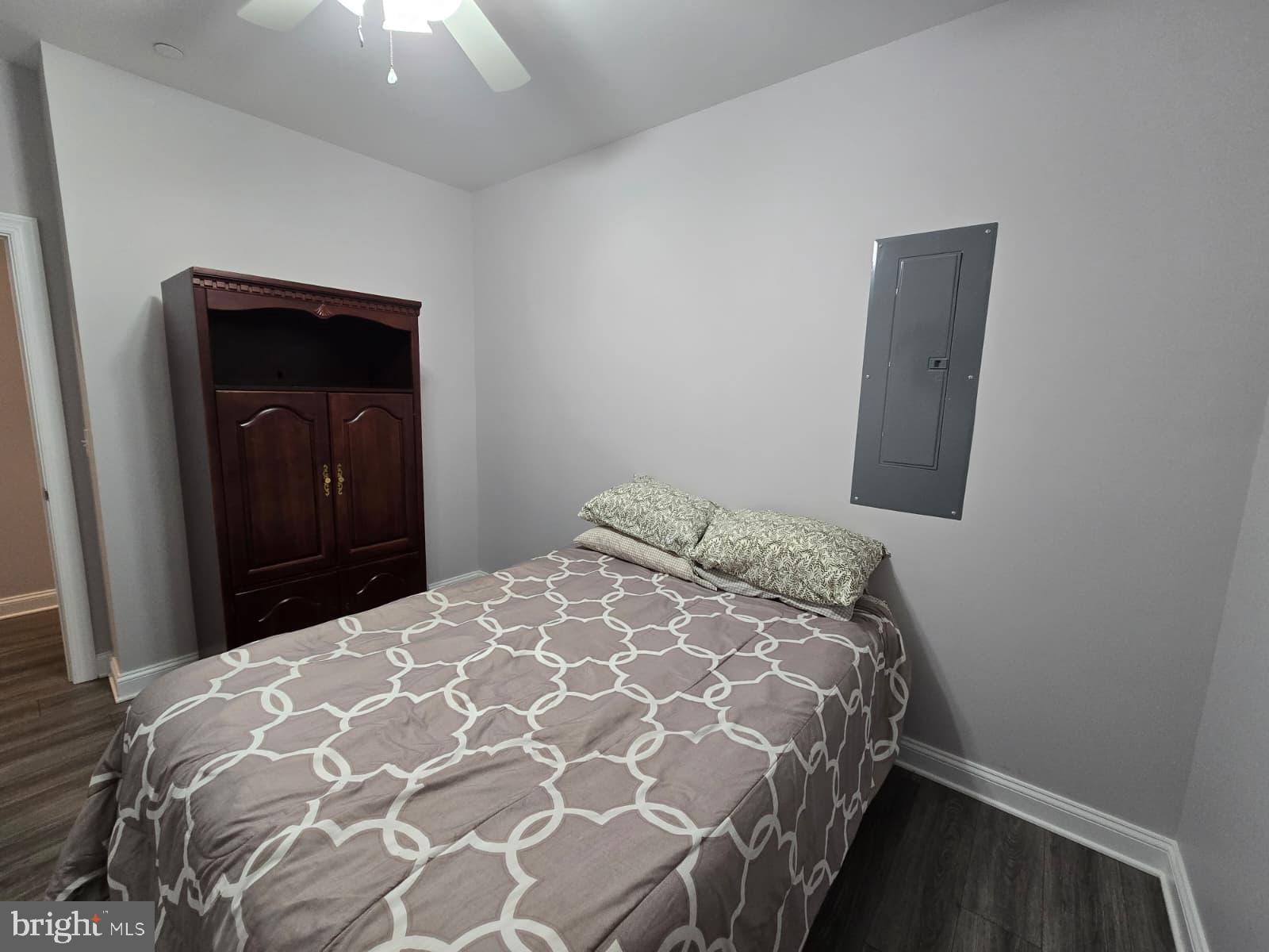 209 3rd Street Crumpton, MD 21628 - Photo 32 of 53 a bedroom with a bed and a window