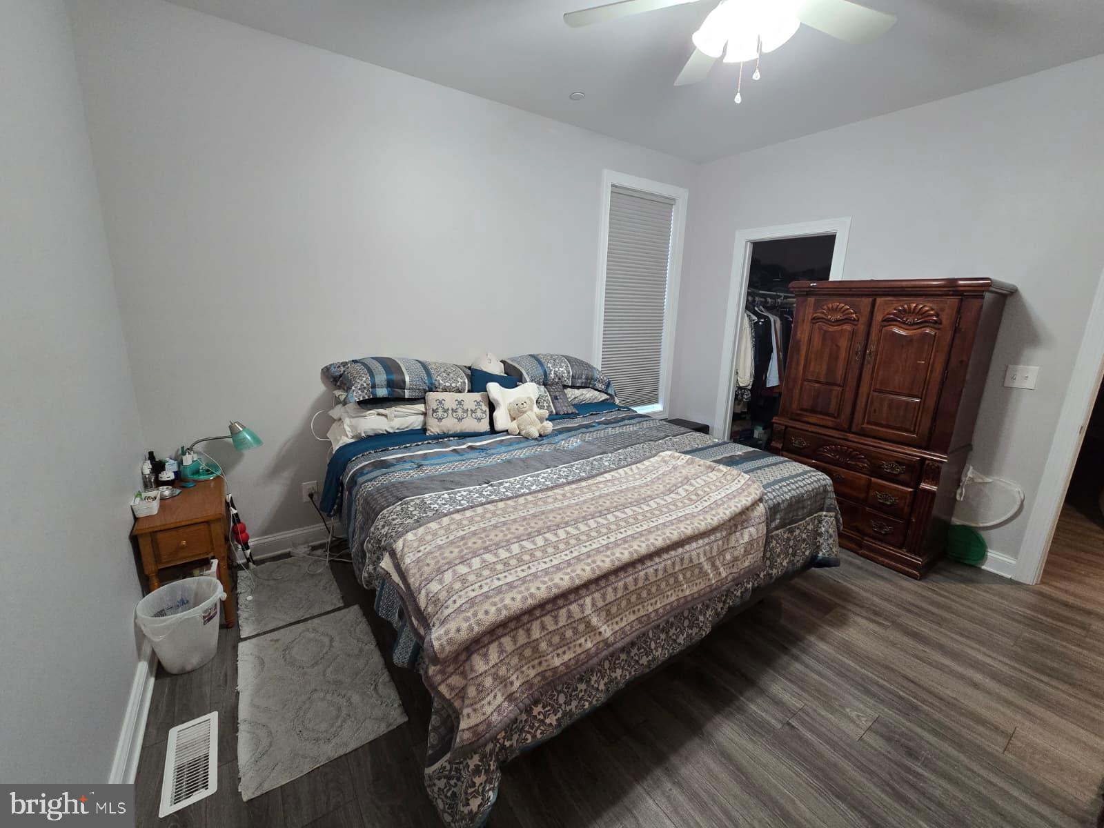 209 3rd Street Crumpton, MD 21628 - Photo 39 of 53 a bedroom with bed and wooden floor