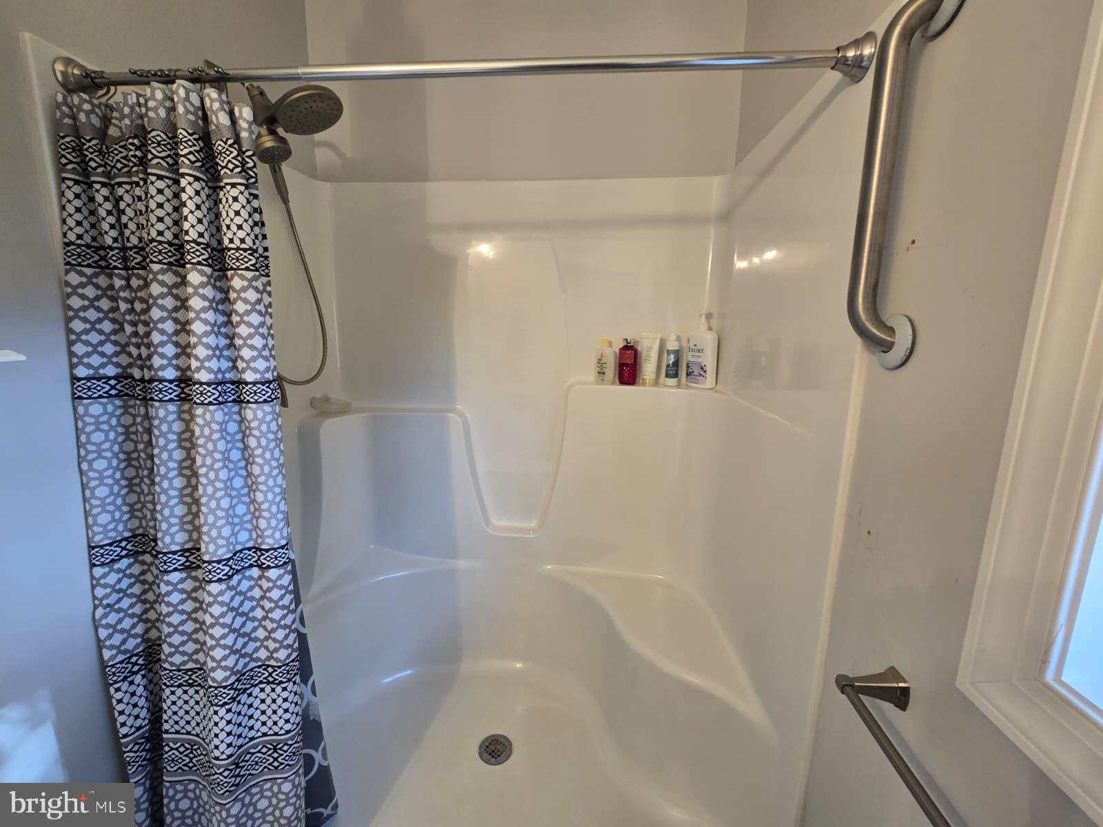 209 3rd Street Crumpton, MD 21628 - Photo 45 of 53 a bathroom with a shower
