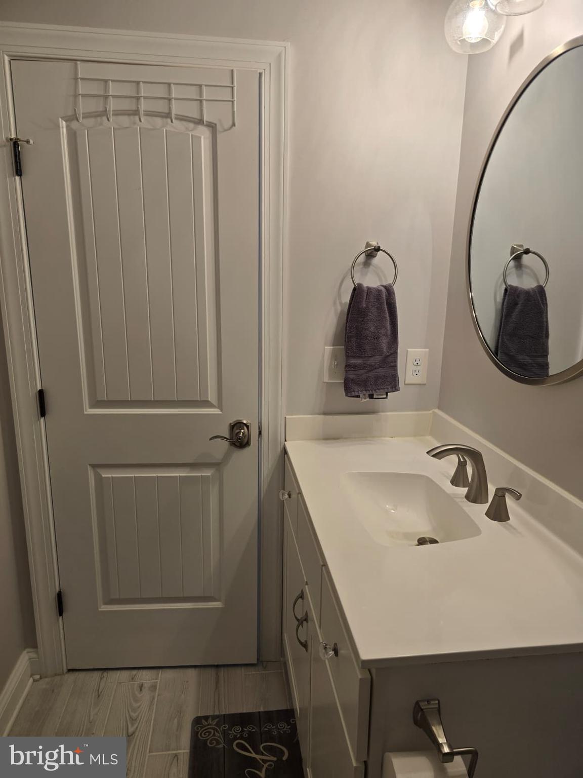 209 3rd Street Crumpton, MD 21628 - Photo 50 of 53 a bathroom with a sink and vanity