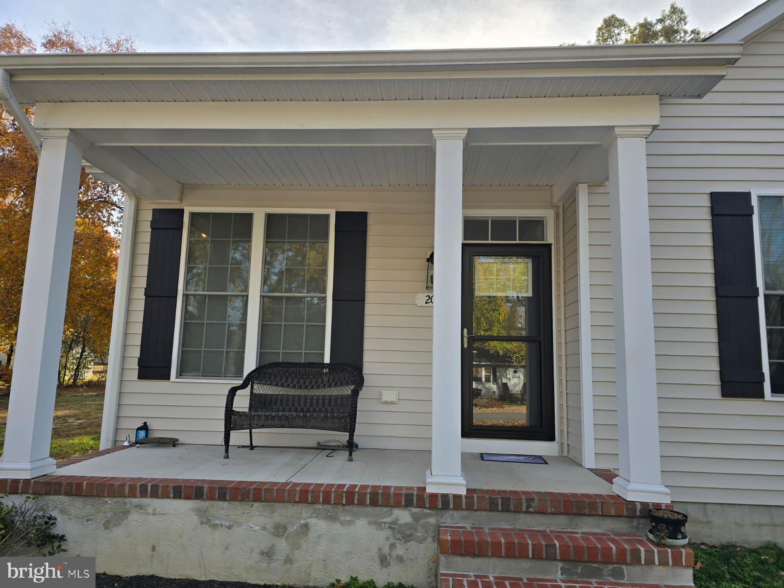 209 3rd Street Crumpton, MD 21628 - Photo 6 of 53 a front view of a house with a yard