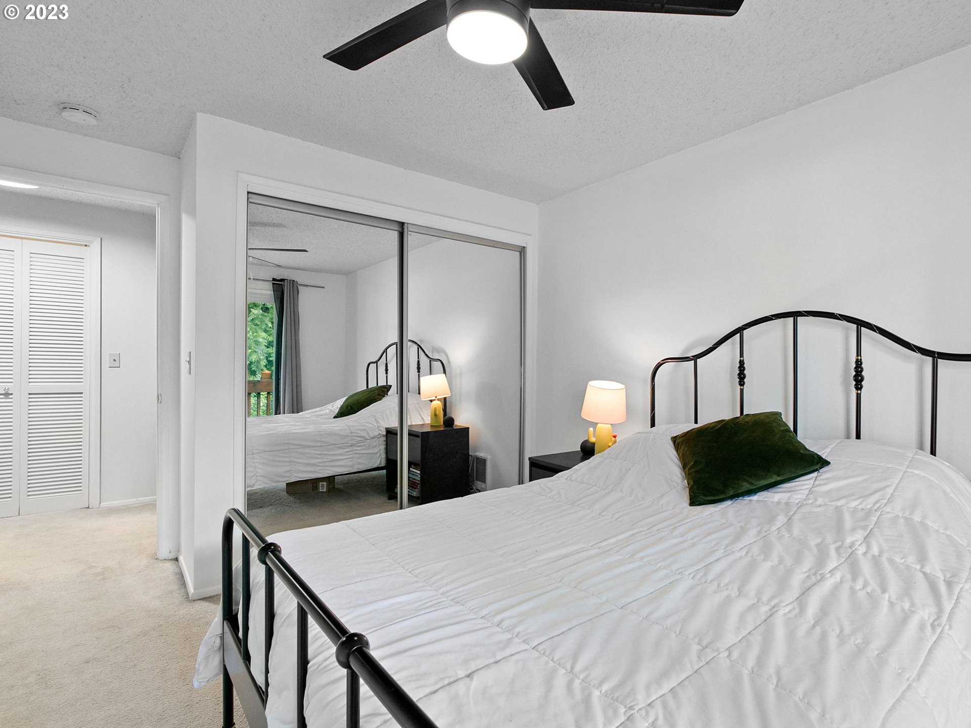 2369 Southeast 112th Avenue, Unit 7 Portland, OR 97216 - Photo 24 of 32 a bedroom with a bed and window